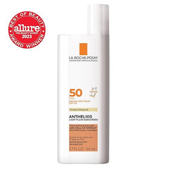 La Roche-Posay Anthelios Tinted Sunscreen SPF 50 | Ultra-Light Fluid Mineral Sunscreen for Face with Titanium Dioxide | Sensitive-Skin Tested | Oil-Free | Travel Size Sunscreen 1.7 Fl Oz